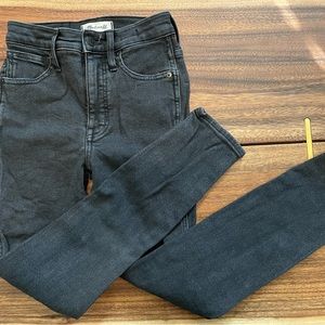 Madewell black 10” high rise skinny jeans.